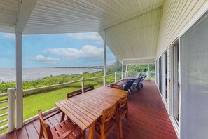Outdoor dining - Wake to Sunrises at a Poipu Oceanfront Cliff Oasis (Keaau)