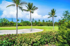 A golf course with palm trees and a well-maintained lawn. - Keauhou Punahele Golf/Beach Condo - Pool, Hot Tub, WIFI, Kitchen, BBQ, Laundry (Kailua-Kona)