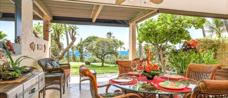 Covered Outdoor Lanai with Dining & Tropical Garden Views