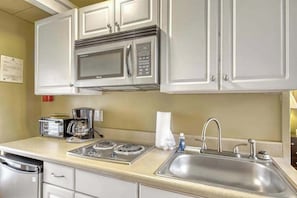 Coffee/tea maker, fridge, microwave, oven