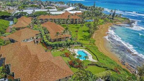 A resort with multiple buildings, a beach, and a pool. - *New* Oceanfront Wailua Escape Near Lae Nani Beach (Kapaa)