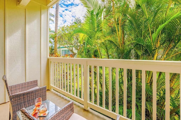 Peaceful Balcony Surrounded By Palms