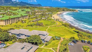 A resort with multiple buildings, a golf course, and a beach. - New Ground-Floor Poipu Escape Near Shipwreck Beach (Koloa)