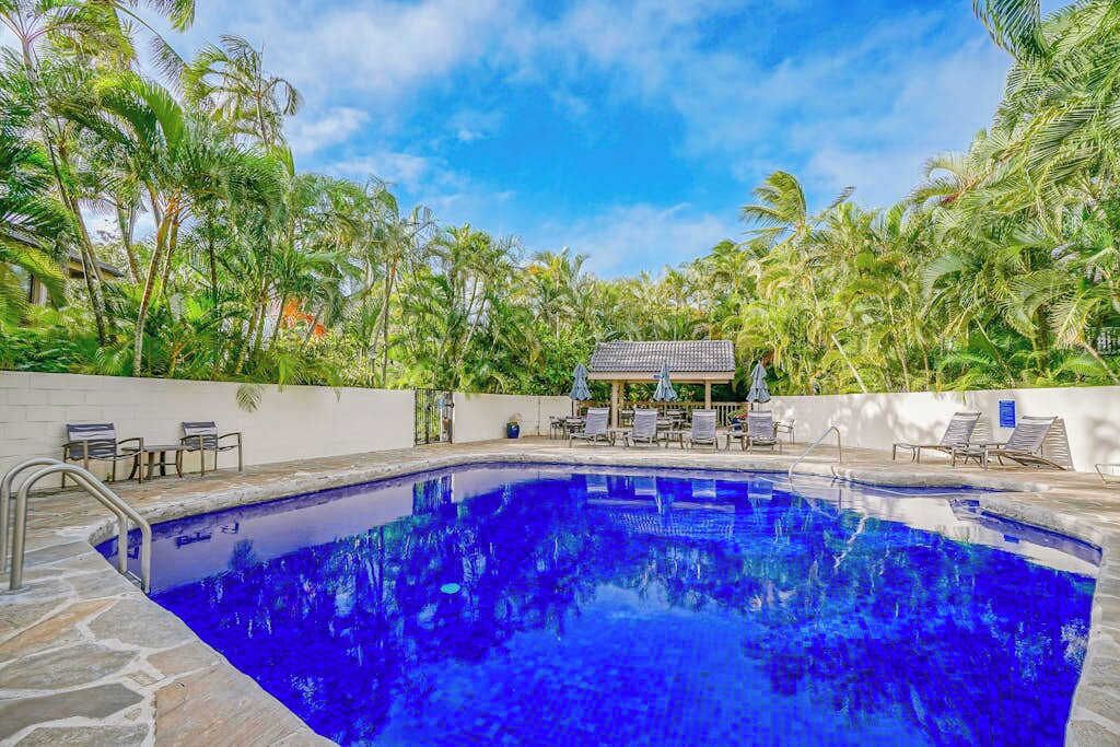 Refreshing Pool Surrounded By Palms