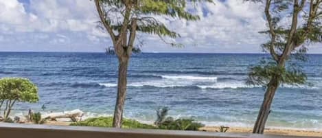 Turquoise Ocean Waves Framing Your Balcony View