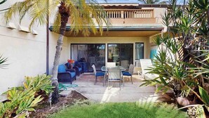 A residential property with a patio, outdoor seating, and a covered area. - *New* Fall Special Garden-View 1BR Kihei Condo Near Kamaole III (Kihei)