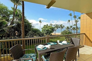 Outdoor dining - Beachfront Kihei Condo with Private W/D & WiFi - Waves Await (Kihei)