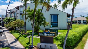 A modern building with a sign reading 'Hale Kamaole 2737' in front. - *New* Fall $ale Kamaole III Beach Days with a Kihei Lanai (Kihei)