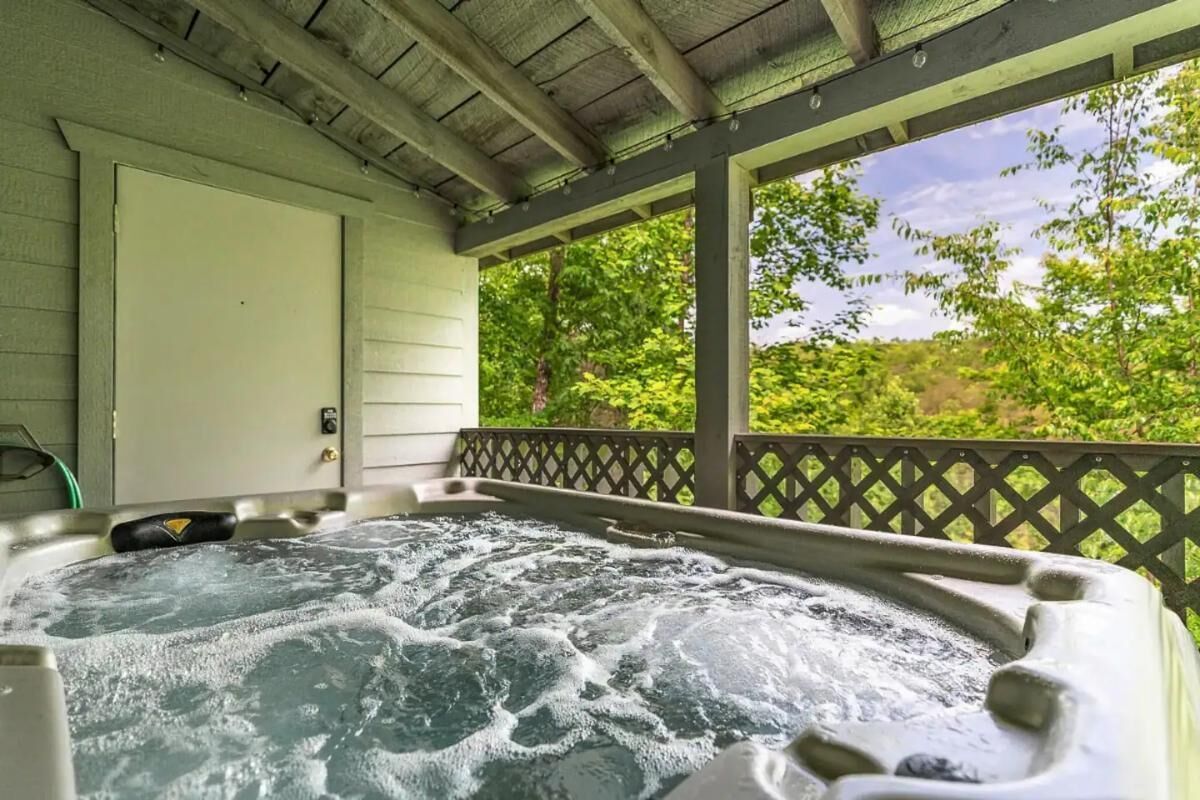 House, 1 King Bed with Sofa bed (Tiny Pines) | Outdoor spa tub