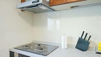 Fridge, microwave, toaster, cookware/dishes/utensils