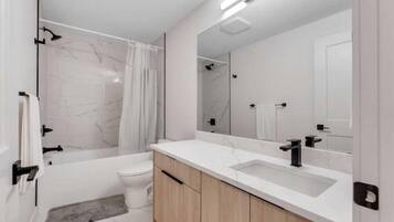 Hair dryer, towels, soap, toilet paper