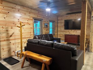 Living area - Cabin by the Falls: Modern 3BR Getaway for Relaxation & Adventure (Calumet)
