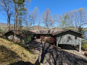 A two-story house with a front porch, a garage, and a small shed. - Llyn Blaen House at Lake Junaluska (Lake Junaluska)
