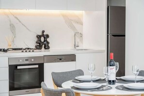 Fridge, microwave, oven, stovetop - LaneStay - Spacious Living 2BR Pool Gym Parking (Melbourne)