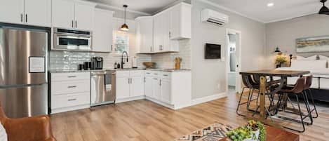 Coffee/tea maker, fridge, microwave, oven