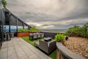 Outdoor dining - Sky One Grand Terrace Penthouse · 3BR 3Bath (Box Hill)