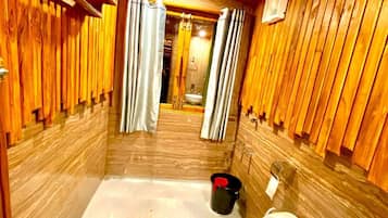 Shower, free toiletries, towels, soap