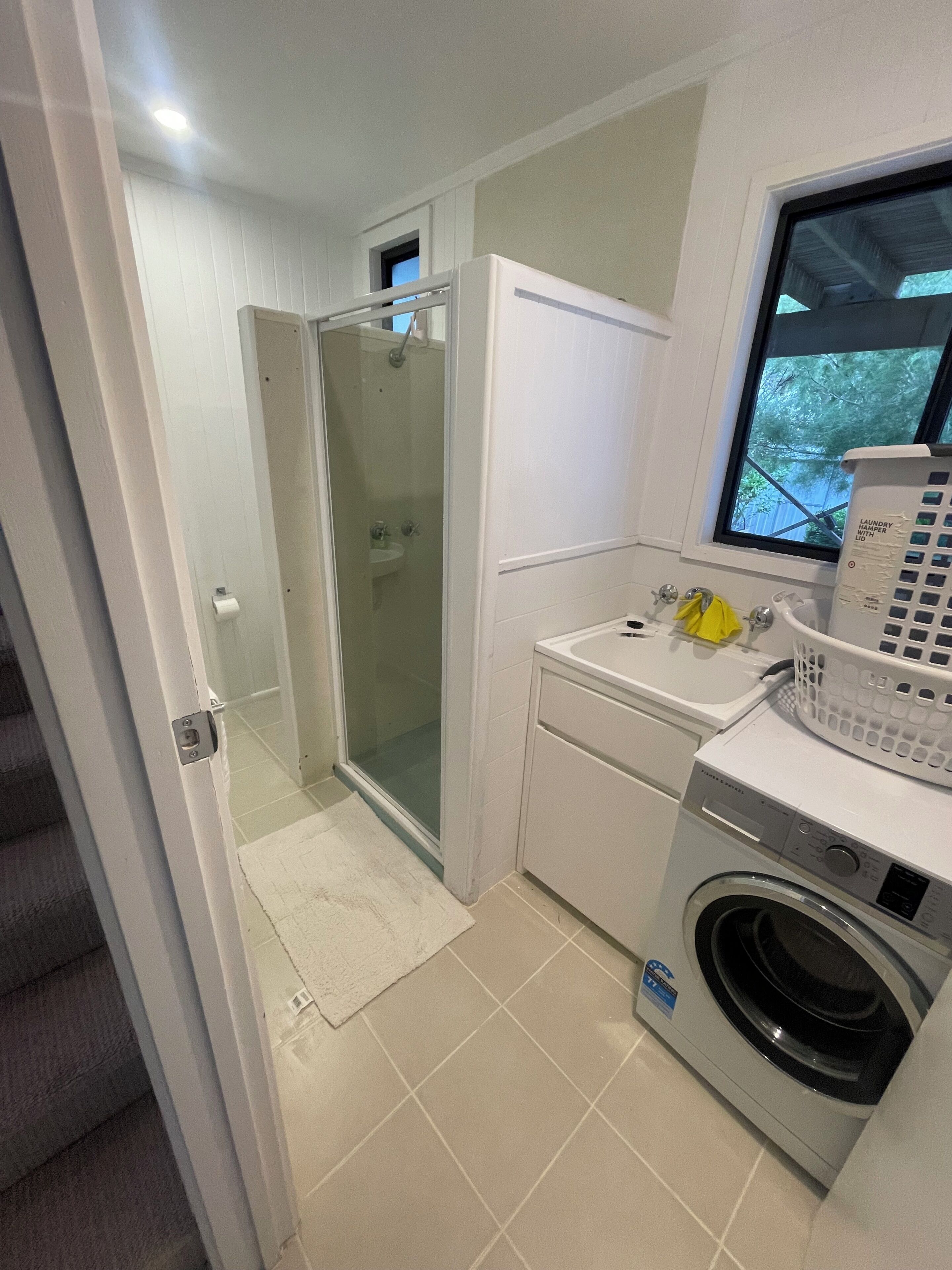 Shower, towels, soap, toilet paper