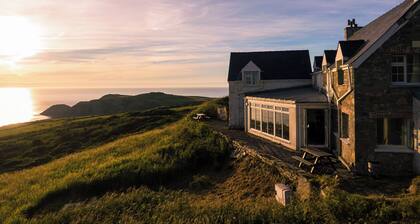 Cliff-top converted farmhouse in the Pembrokeshire Coast National Park.