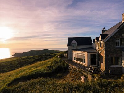 Cliff-top converted farmhouse in the Pembrokeshire Coast National Park.