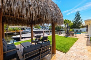 Outdoor dining - Pompano Beach Retreat • Private Pool + Canal-Front Tiki Lounge | Coral Current (Pompano Beach)
