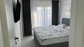 Apartment, Balcony, Beach View | Iron/ironing board, free WiFi