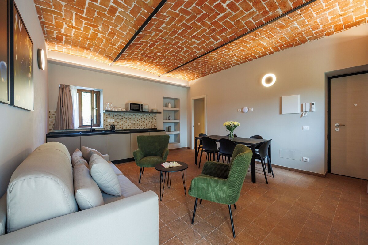 Departamento, vista al jardín (Casa 2) | Área de sala de estar