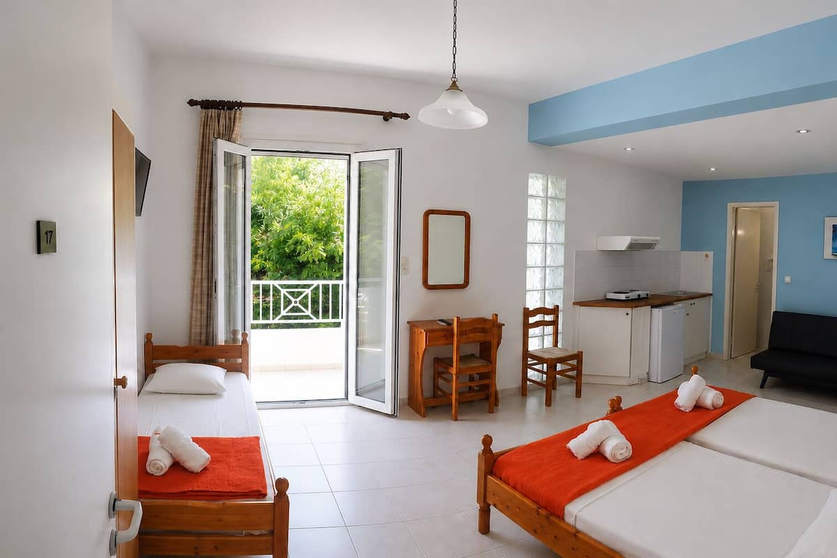 Family Quadruple Room, Balcony, Garden View | WiFi (free), bed sheets