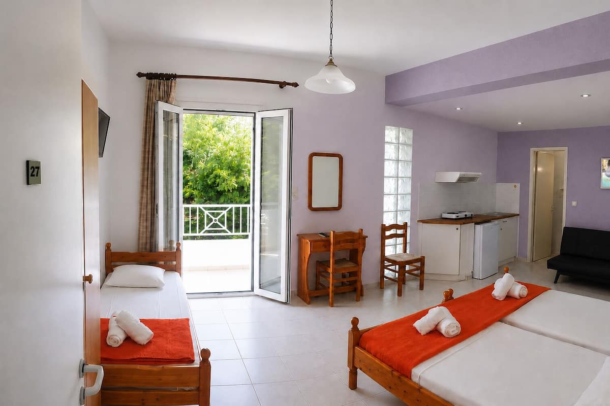Family Quadruple Room, Balcony, Garden View | WiFi (free), bed sheets