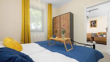 Iron/ironing board, travel crib, WiFi, bed sheets