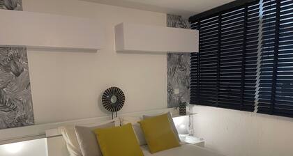 Ground floor of a villa with a garden and private parking