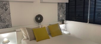 Ground floor of a villa with a garden and private parking