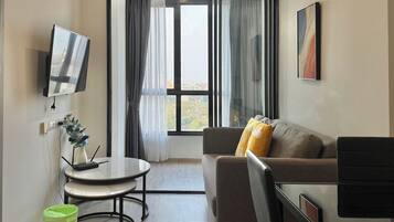 Standard Condo, Balcony, City View | Living area