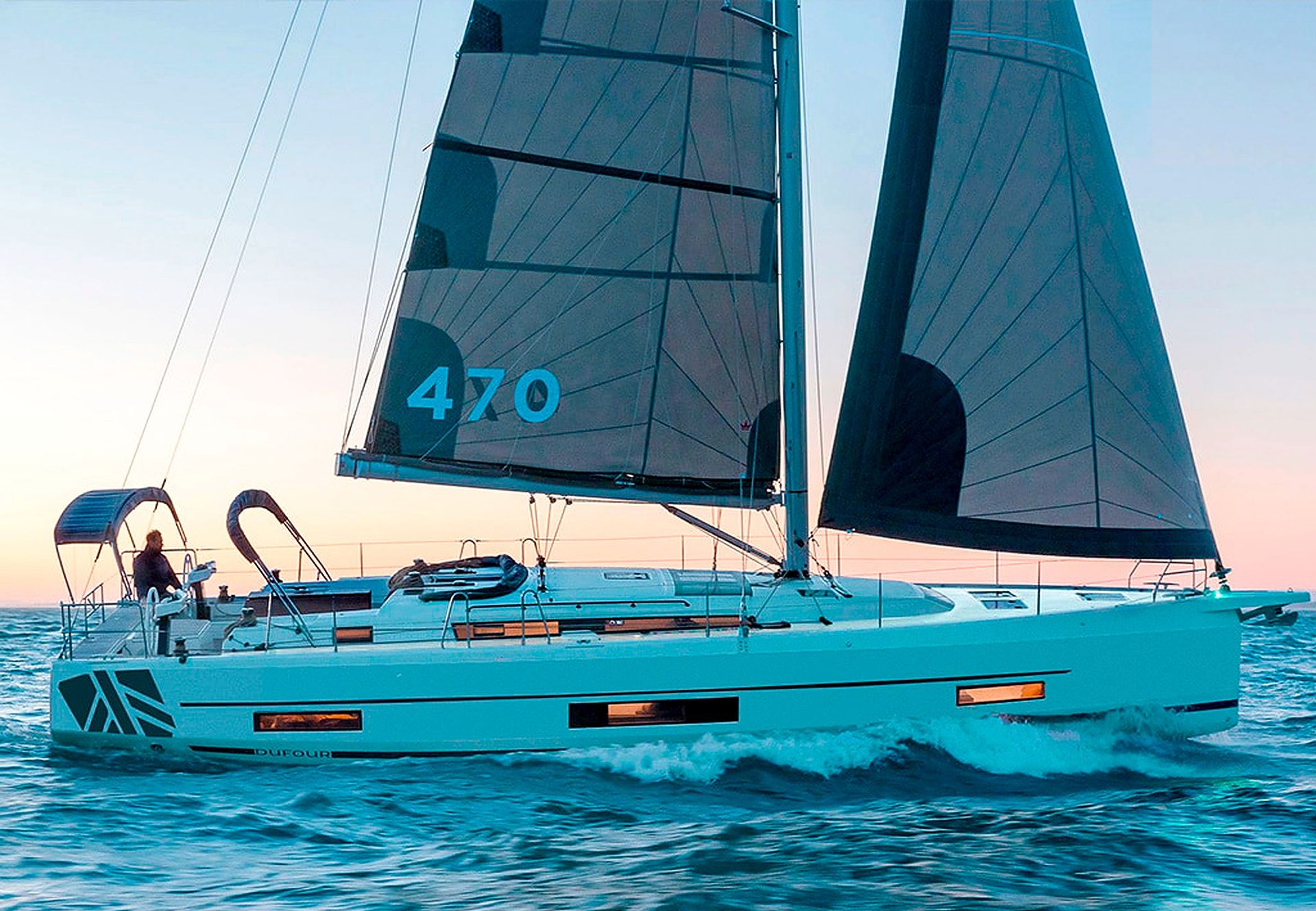 A sailboat with the number 470 on its sail, sailing on the water.