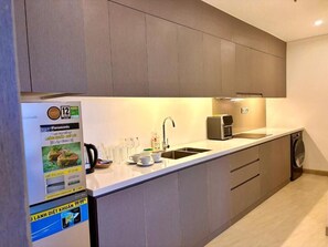 Deluxe Apartment, Balcony, City View | Private kitchen - Golden Bay 2 Bedrooms Apartment (Da Nang)