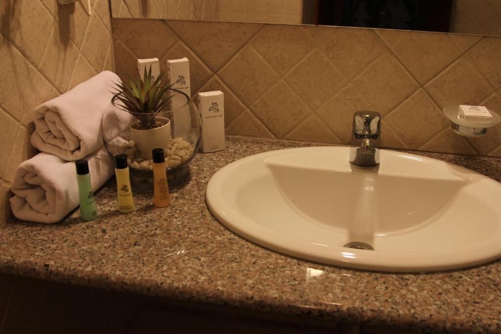 Family Room, Balcony | Bathroom | Shower, free toiletries, hair dryer, slippers