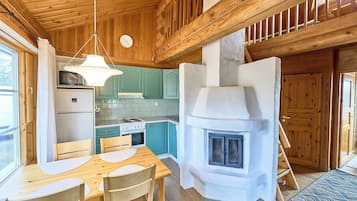 Rukan Havu - Ski-in cabin with sauna & fireplace, 100m to slopes | Private kitchen | Full-size fridge, microwave, oven, stovetop