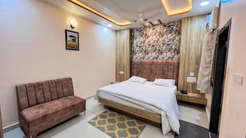 Desk, laptop workspace, blackout drapes, rollaway beds