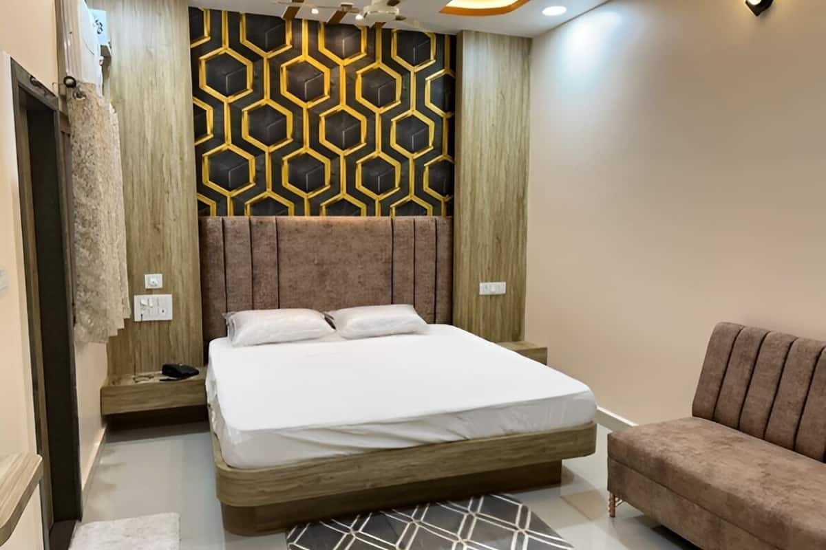 Habitación Deluxe | Escritorio, espacio para trabajar con un portátil, cortinas opacas