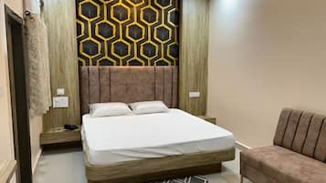 Desk, laptop workspace, blackout drapes, rollaway beds
