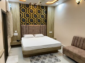 Deluxe Room | Desk, laptop workspace, blackout curtains, rollaway beds - HOTEL GANGA RAM (Chitrakoot)