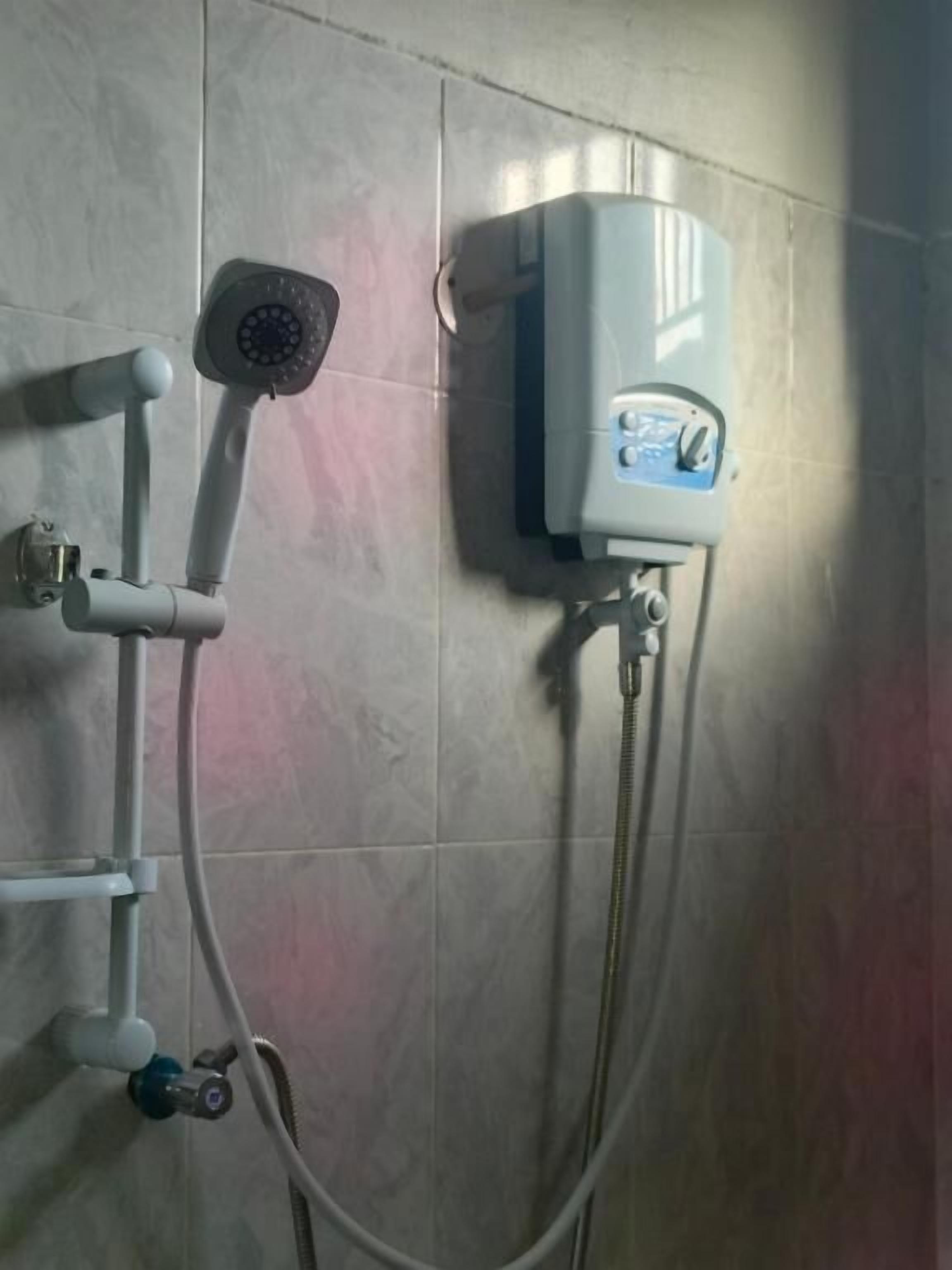 Shower, free toiletries, slippers, towels