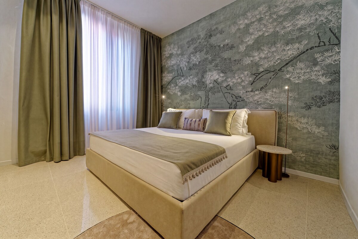 Departamento superior | Tabla de planchar con plancha, wifi gratis y ropa de cama 
