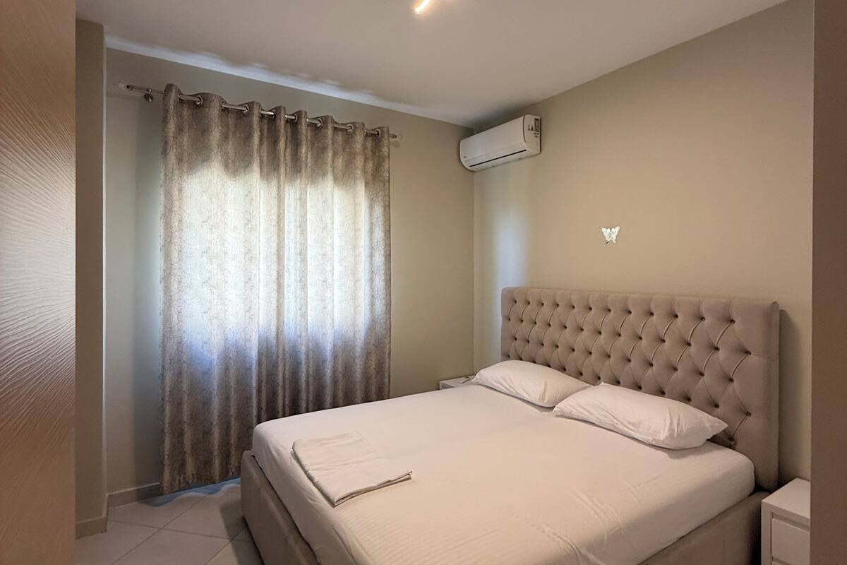 Appartement, 2 chambres, balcon, vue partielle sur la mer | Fer et planche à repasser, accès au Wi-Fi (inclus)