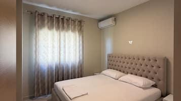 Apartment, 2 Bedrooms, Balcony, Partial Sea View | Iron/ironing board, free WiFi
