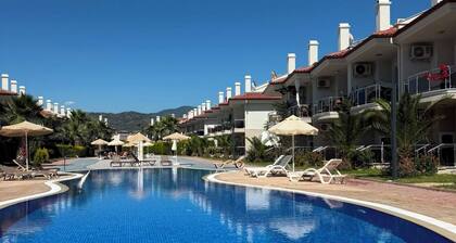 Beautiful 2-bedroom condo with AC in enchanting in Sunset Beach Club,Fethiye