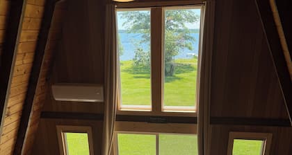 A frame cabin on private Long Lake 12 mi NW Bemidji. AC sleeps 5- 2 dogs allowed