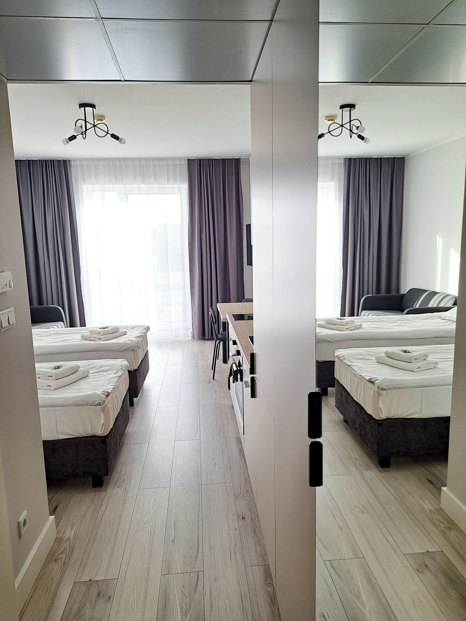 Apartment, 2 Twin Beds, Kitchenette | Desk, laptop workspace, blackout drapes, iron/ironing board