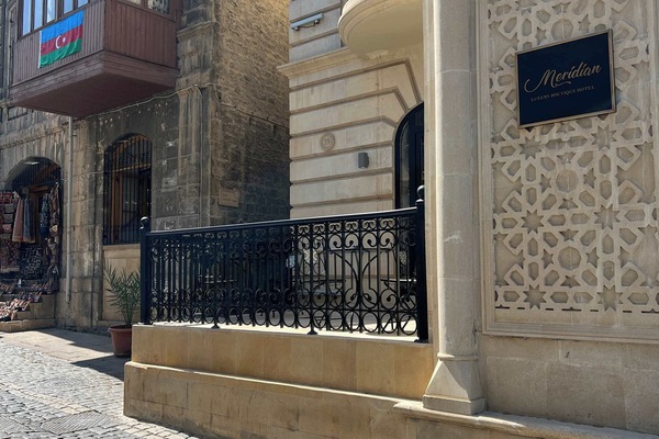 Old City street approach near the apartment entrance.