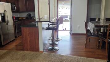 Coffee/tea maker, fridge, microwave, oven